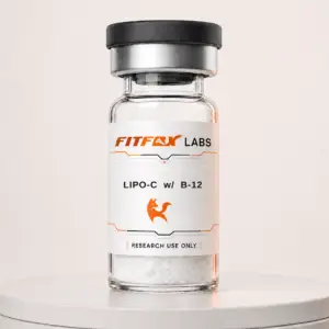 Clear glass vial containing white powder with a white label that reads 'LIPO-C w/ B-12' and 'RESEARCH USE ONLY' from FitFox Labs, featuring an orange fox logo.